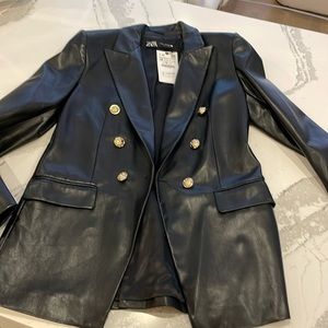 Faux leather blazer new with the tags. Longline blazer fits oversized